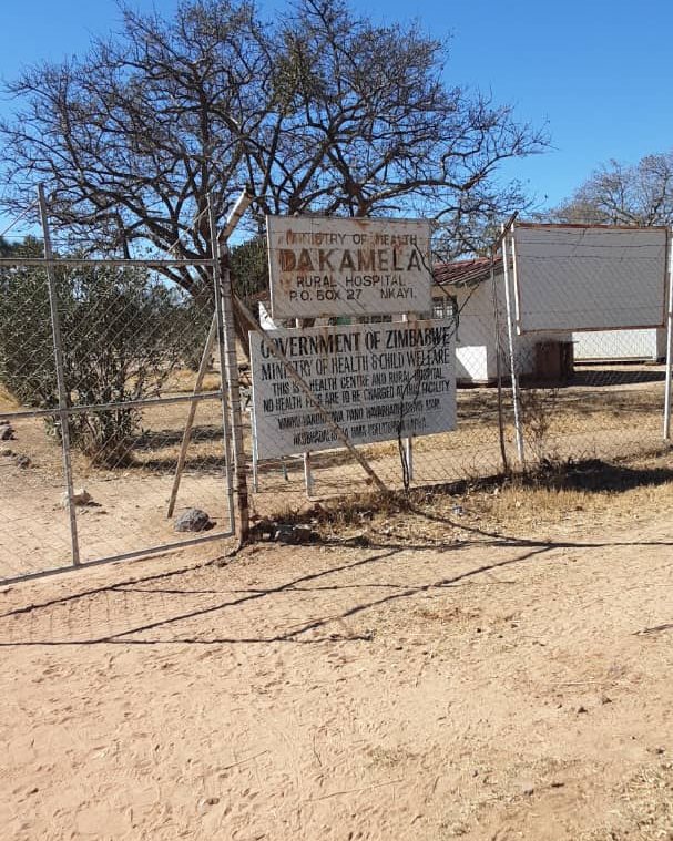 The main gate and Ministry of Health signboard at Dakamela Rural Hospital, Nkayi