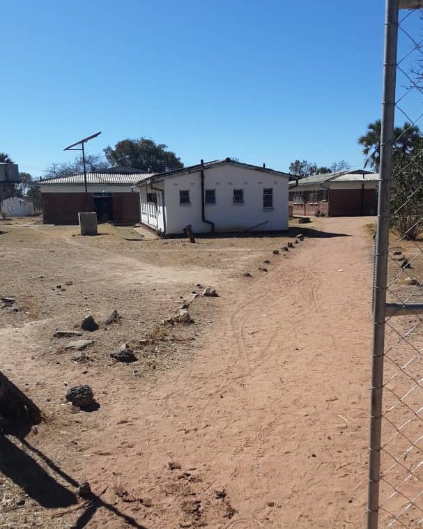Ward buildings at Dakamela Rural Hospital: the male ward is the first building on the left and the maternity ward is on the right